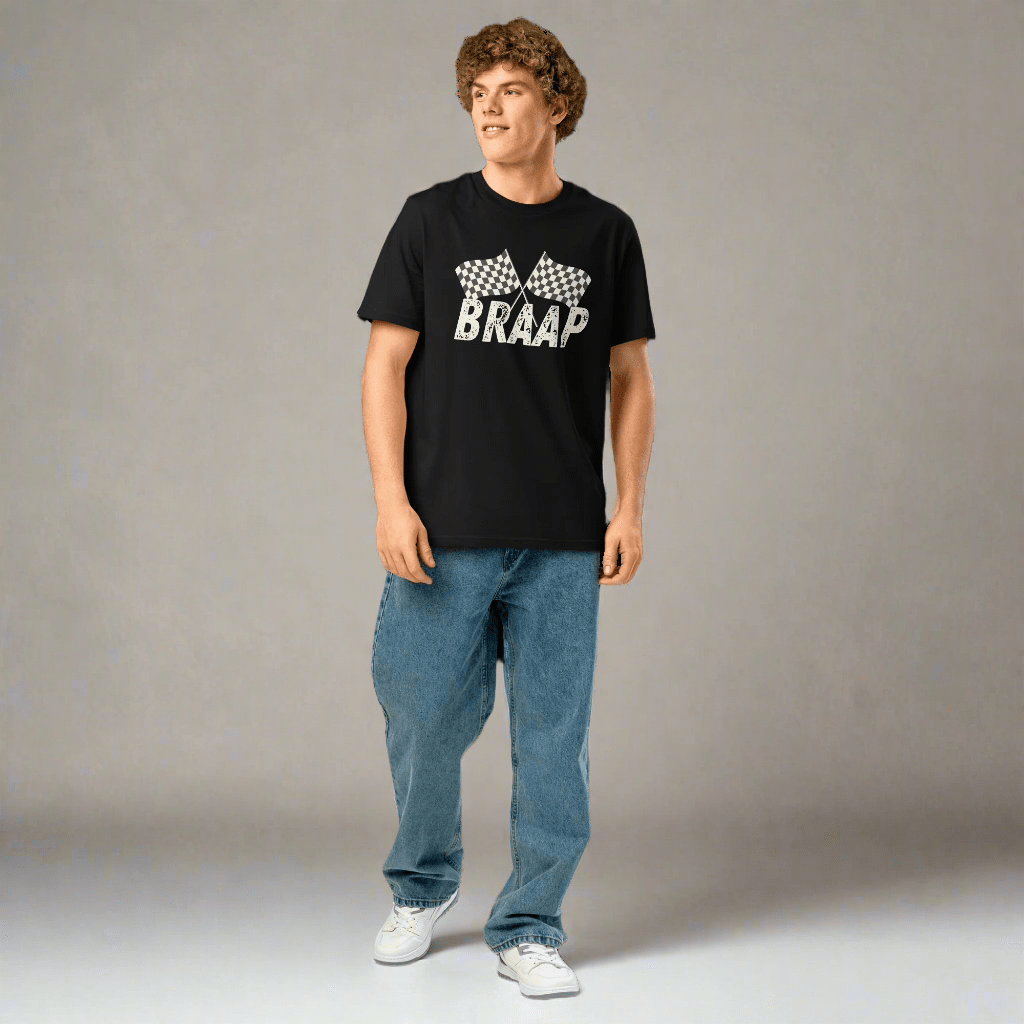 Person wearing a black t-shirt with 'BRAAP' text and checkered design on a neutral background