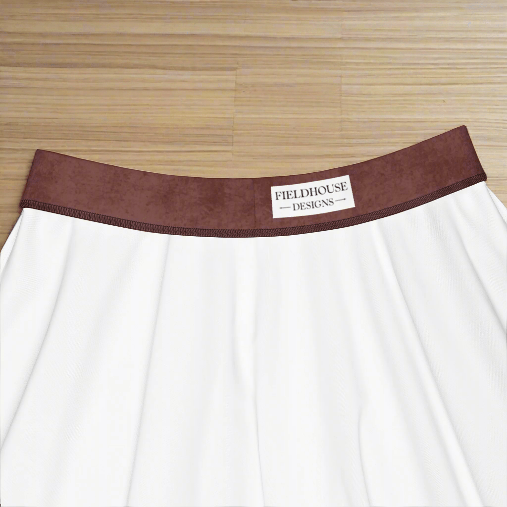 burgundy waistband featuring 'Fieldhouse Designs' label on a wooden surface.