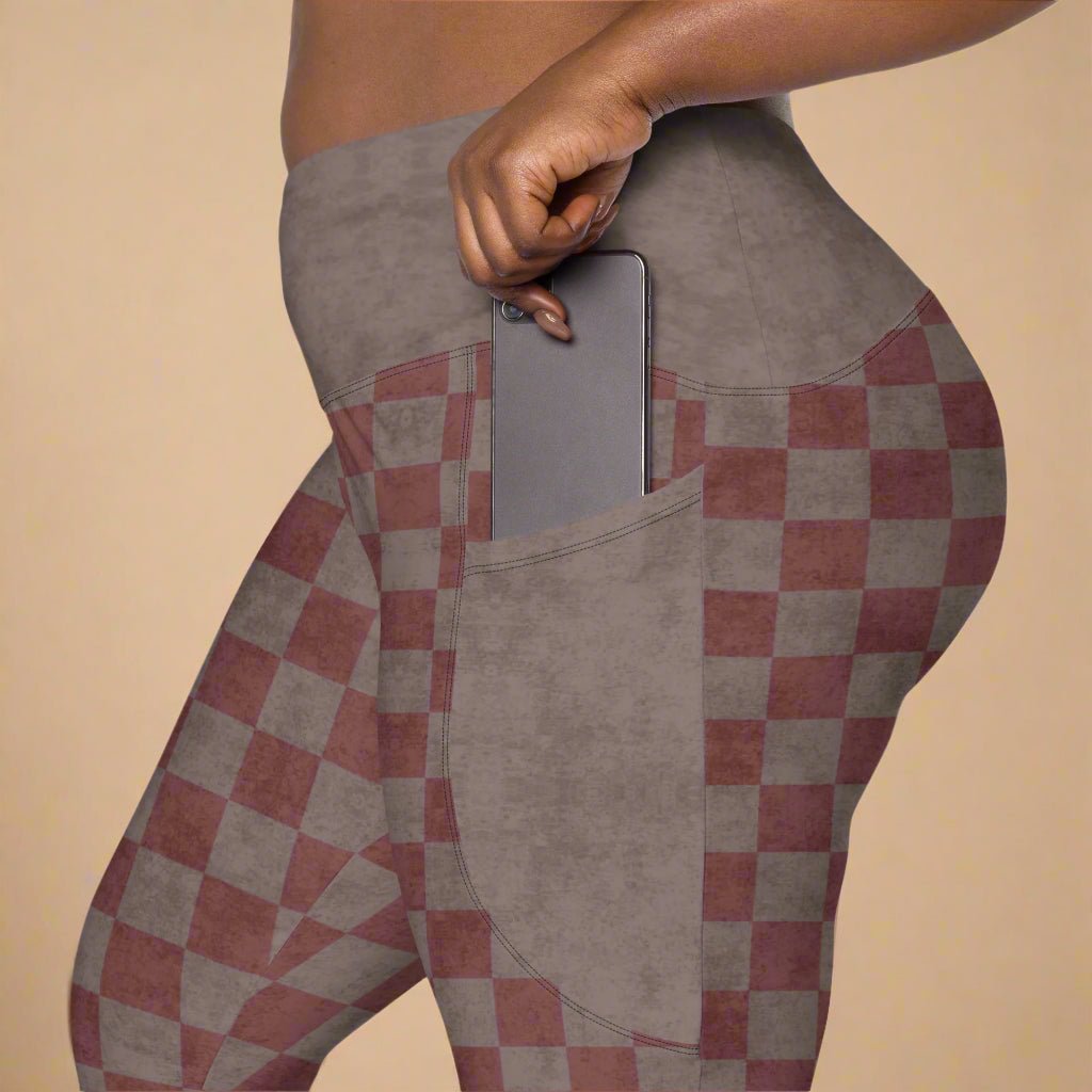 Checkered leggings with a pocket on a beige background