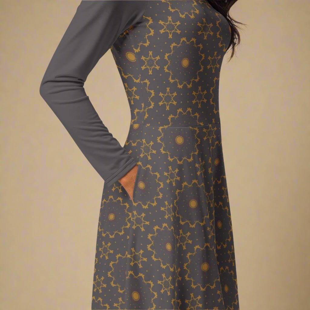 Long-sleeve dress with geometric pattern on a plain background