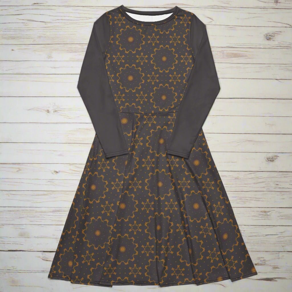 Dark gray dress with geometric pattern on a wood background