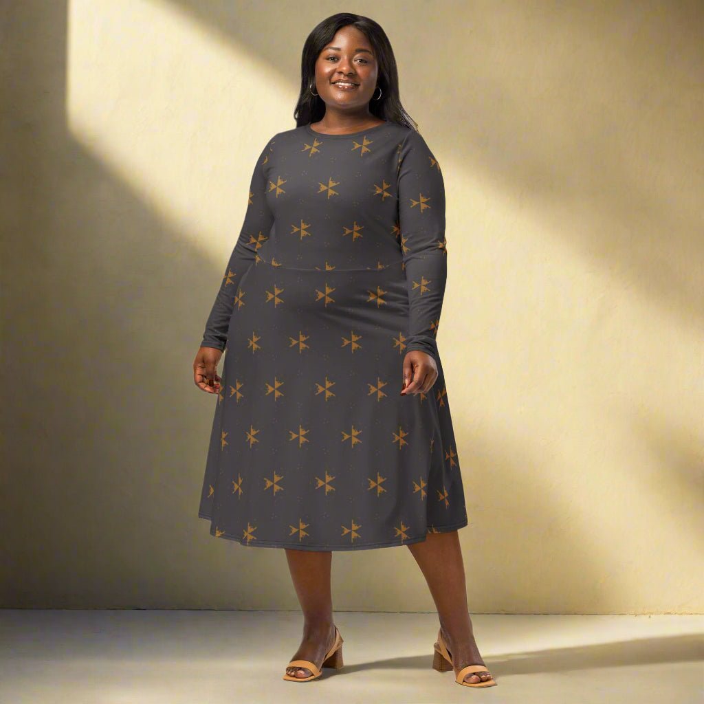 Woman wearing a gray dress with star pattern against a beige background