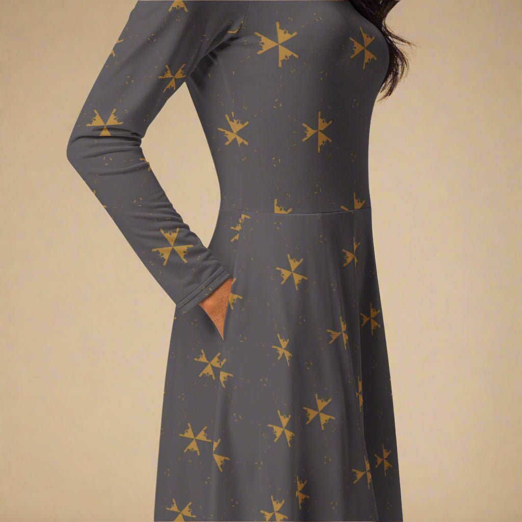 Gray dress with gold star patterns on a beige background