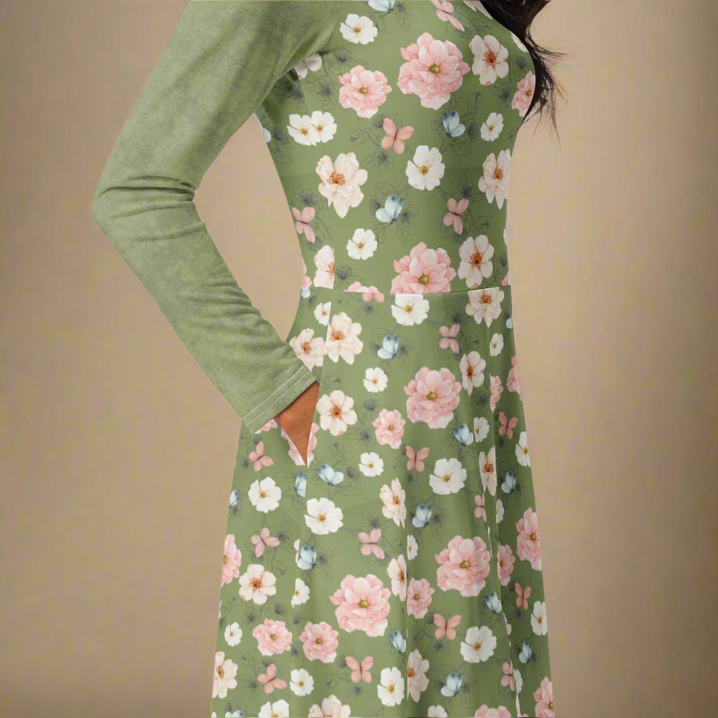 Green dress with floral pattern on a beige background