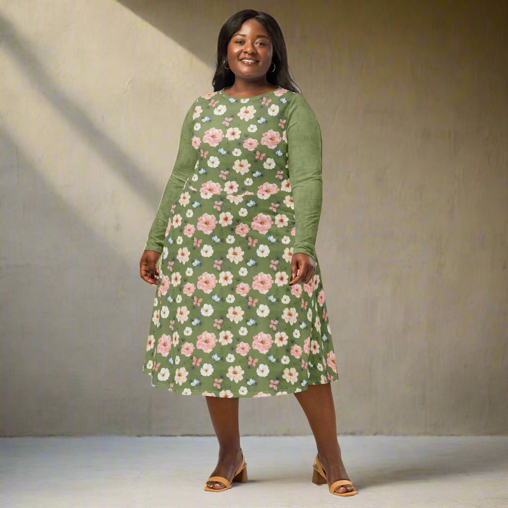 Woman wearing a green floral dress on a beige background