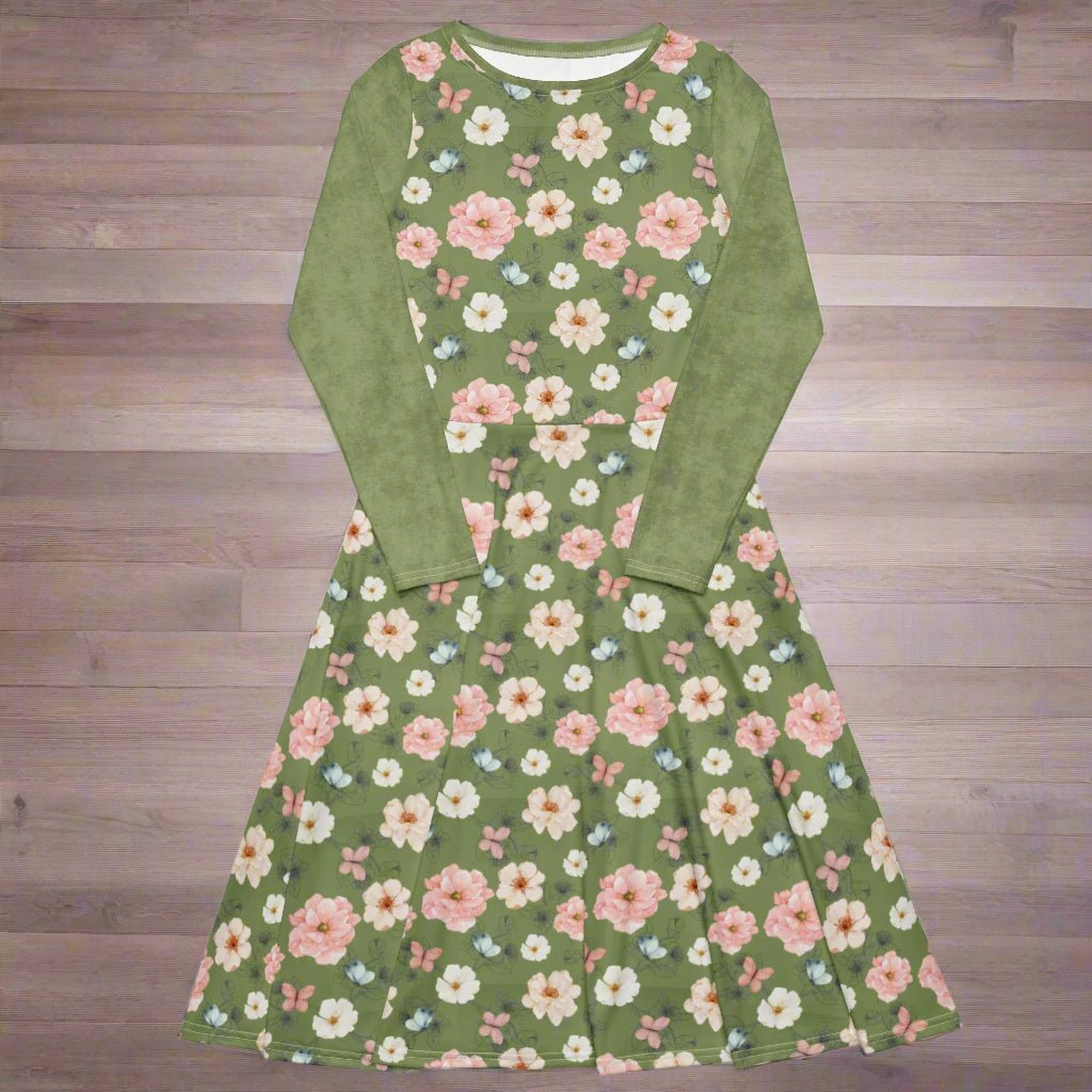 Green dress with floral pattern on a wooden floor