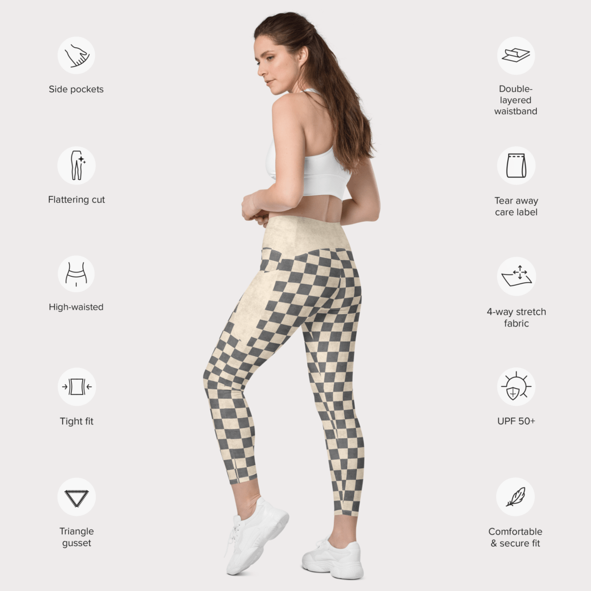 Woman wearing checkered leggings with feature icons on a white background