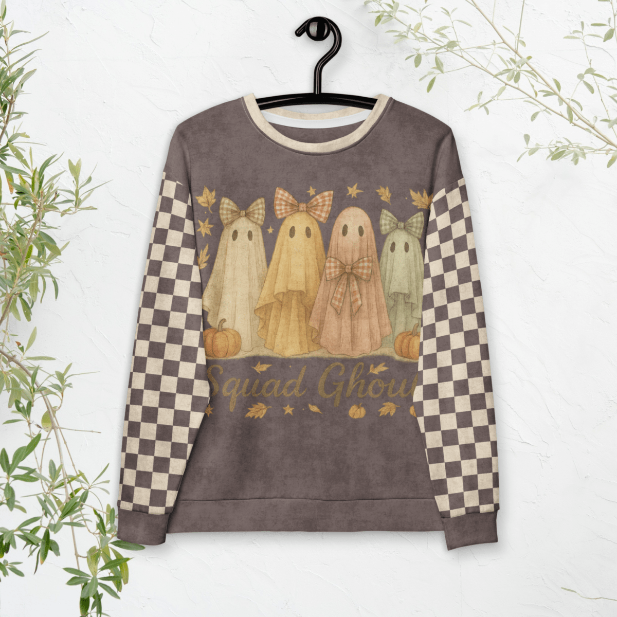 Espresso Squad Ghouls Sweatshirt with ghost design and checkered sleeves on a hanger against a white background