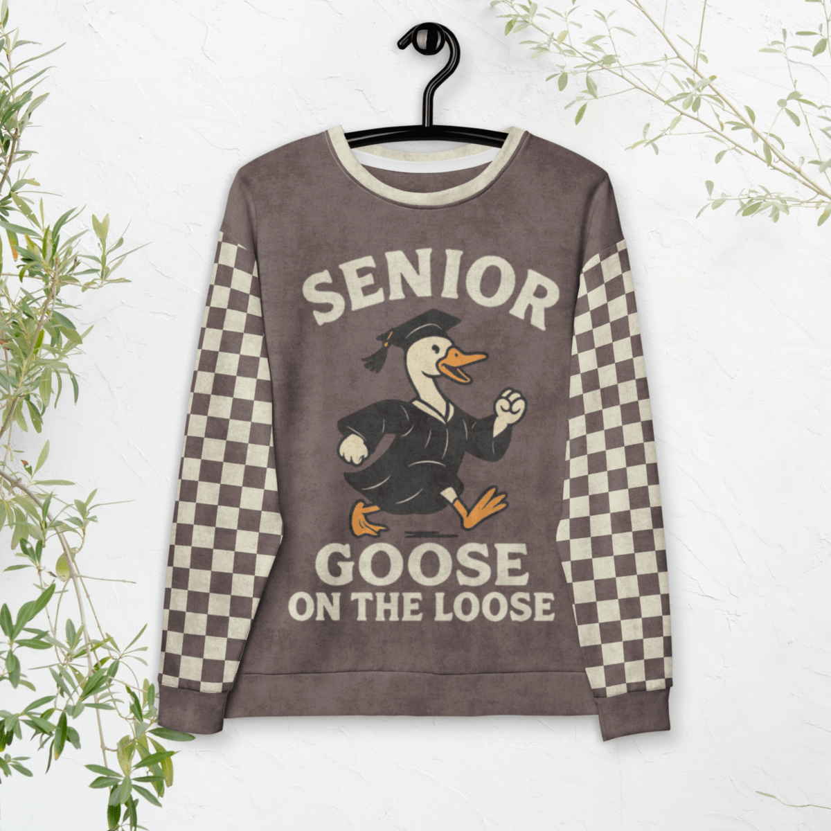 Sweatshirt with 'Senior Goose on the Loose' design on a hanger against a white background