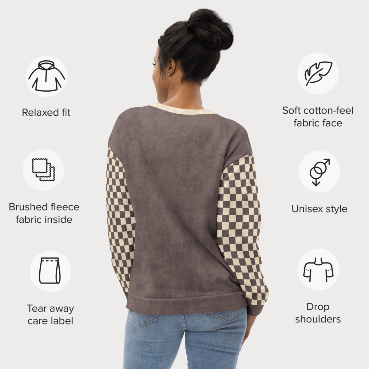 Woman wearing an espresso sweatshirt with checkered sleeves, surrounded by icons and text describing features.
