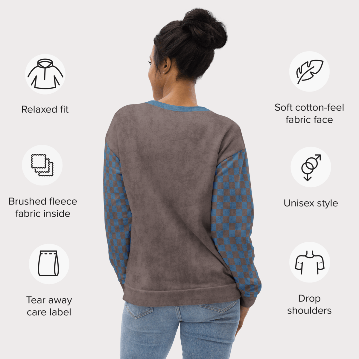 Woman wearing Espresso and denim Sweatshirt with checkered sleeves, surrounded by icons and text describing features.