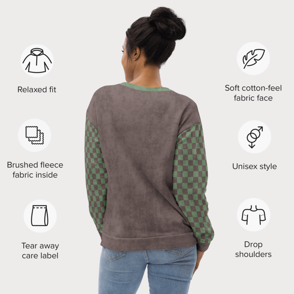 Person wearing an Espresso sweatshirt with sage green checkered sleeves, surrounded by product features on a white background.