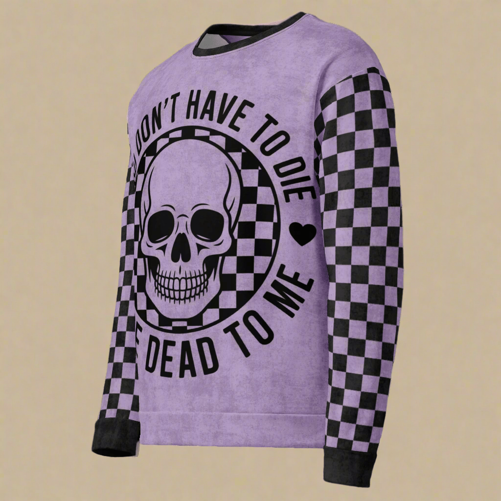 Purple sweatshirt with skull design and text on a beige background