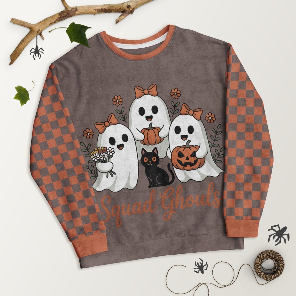 Halloween-themed sweatshirt with ghosts and a cat design on a white background.