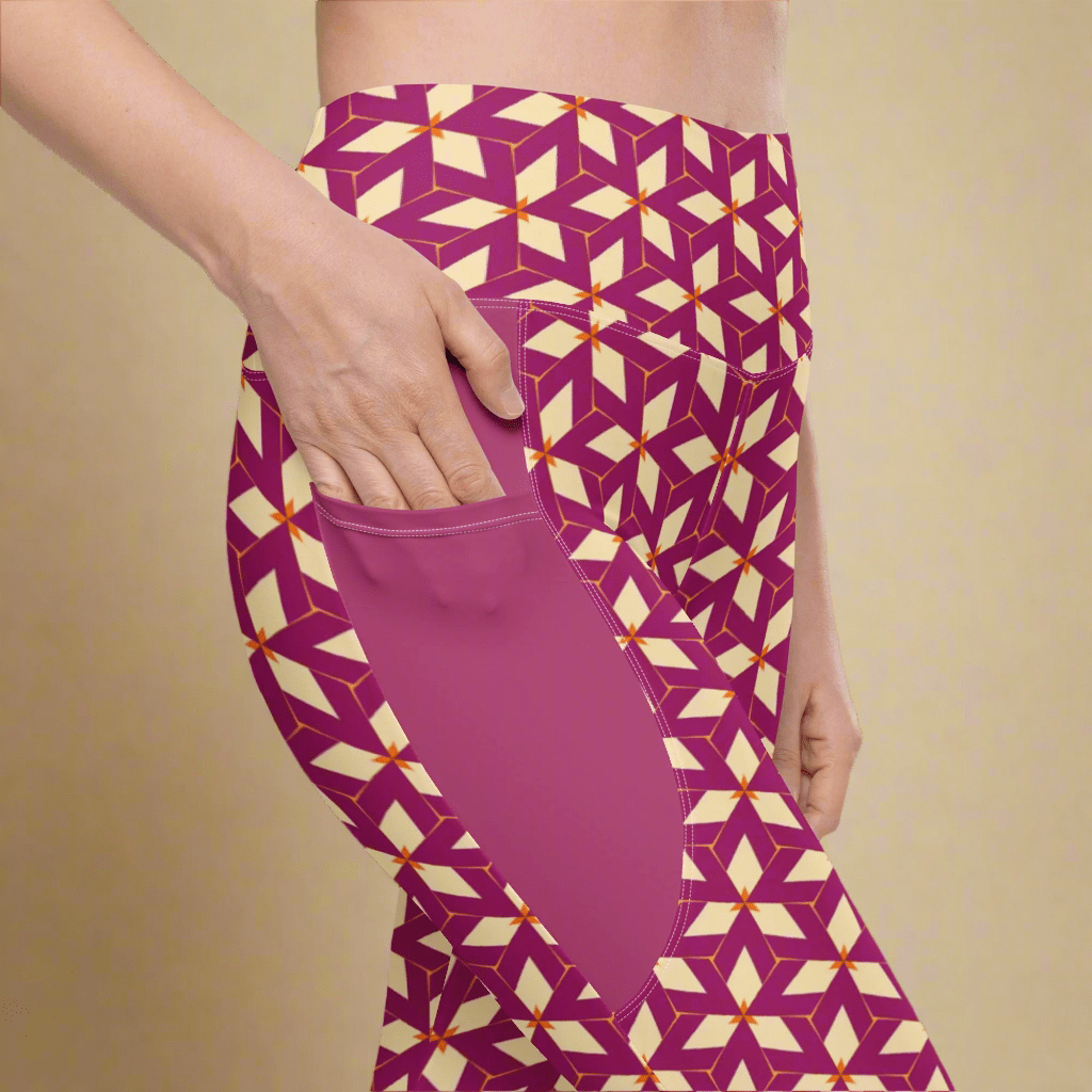 Purple leggings with geometric pattern worn by a person on a beige background