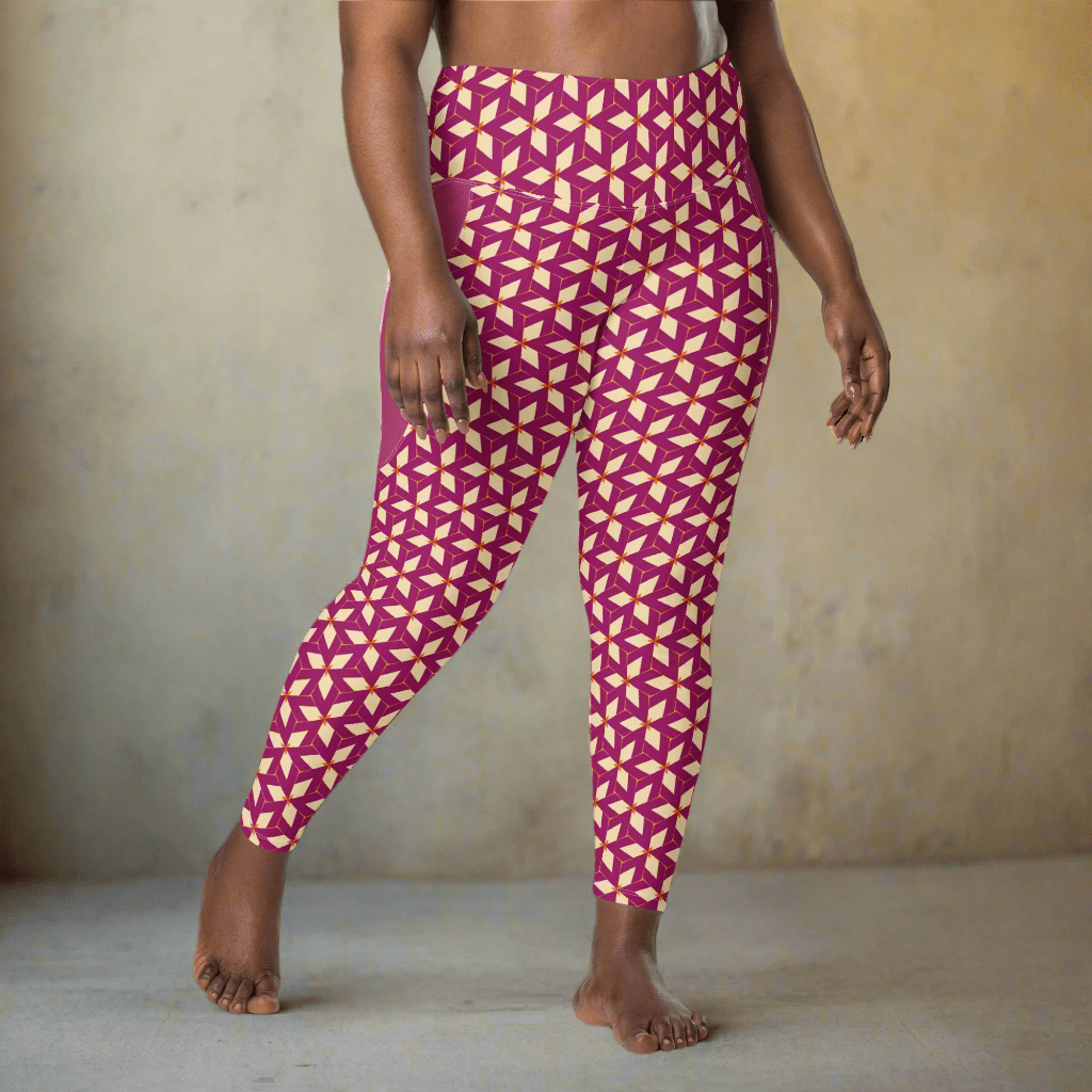 Person wearing purple leggings with cream geometric pattern against a neutral background