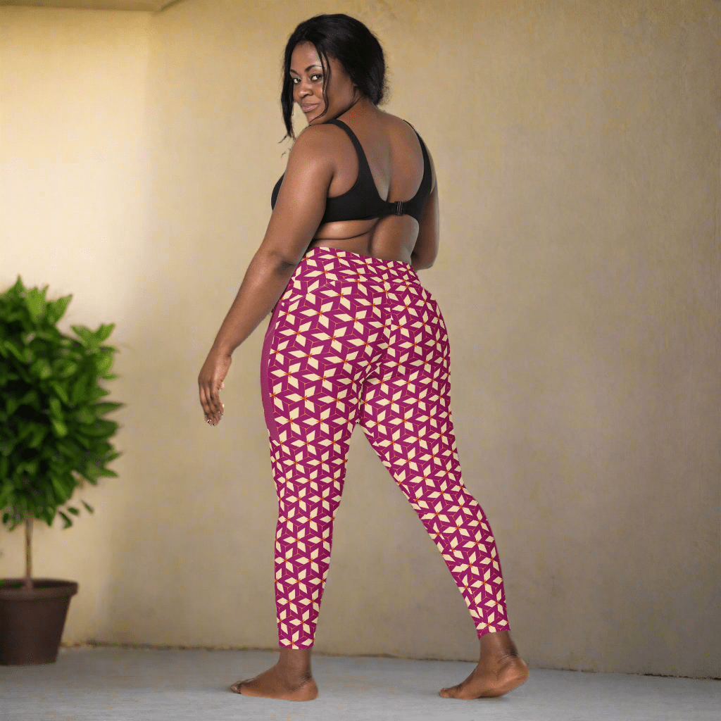 Woman wearing purple and cream geometric patterned leggings on a neutral background