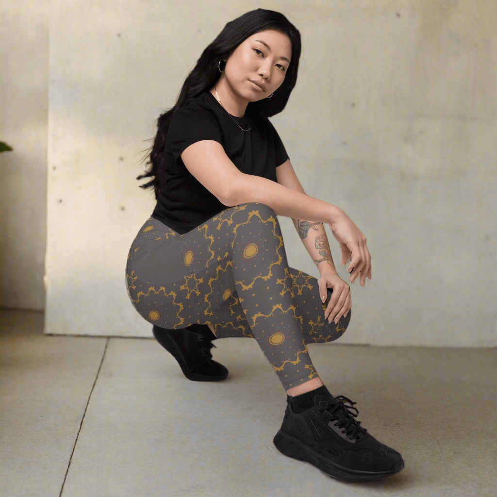 Woman wearing patterned leggings and black shoes on a beige background