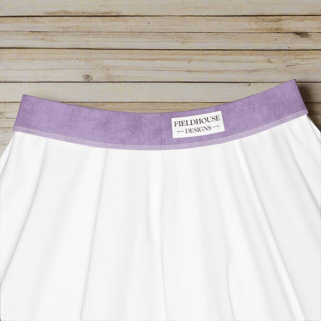 purple waistband and 'Fieldhouse Designs' label on a wooden background