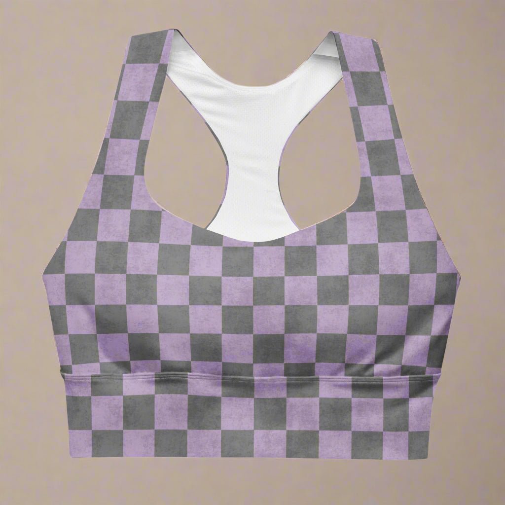 Purple and gray checkered sports bra on a beige background