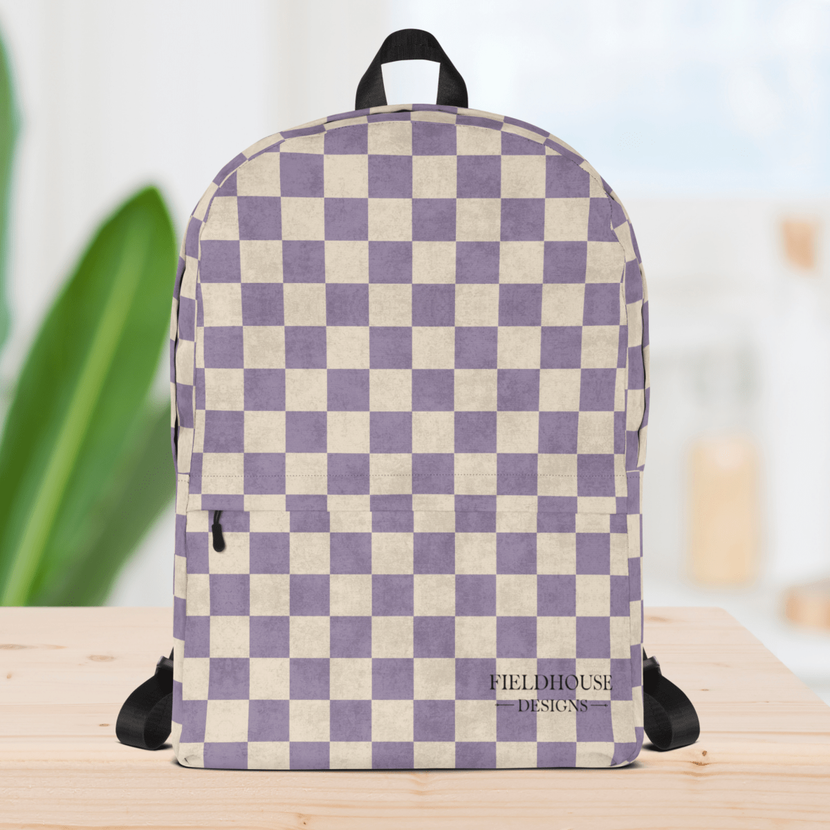 Checkered backpack with purple and beige pattern on a wooden surface