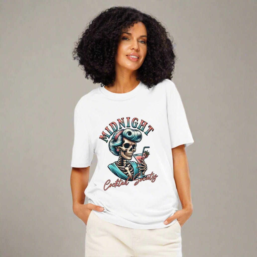 Woman wearing a white t-shirt with a colorful skeleton design on a white background