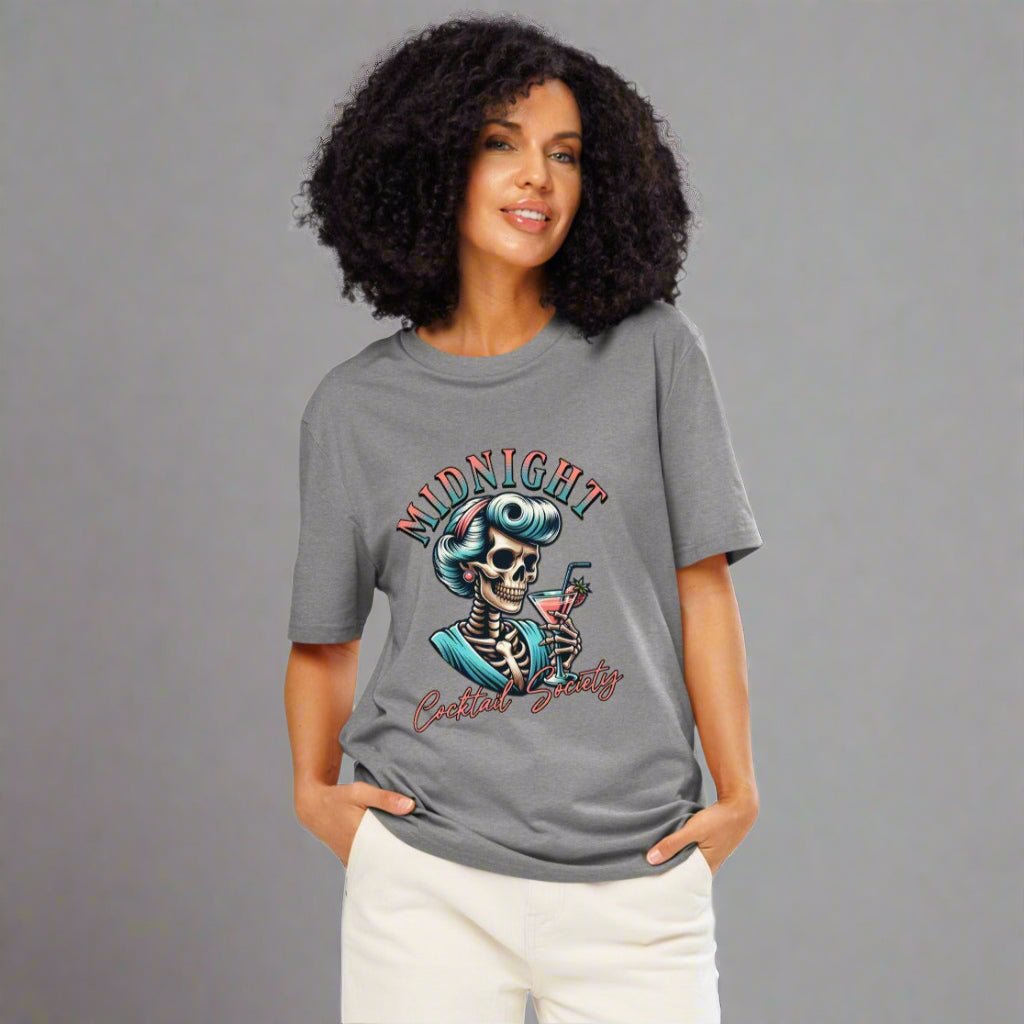 Woman wearing a gray t-shirt with a skeleton design on a white background