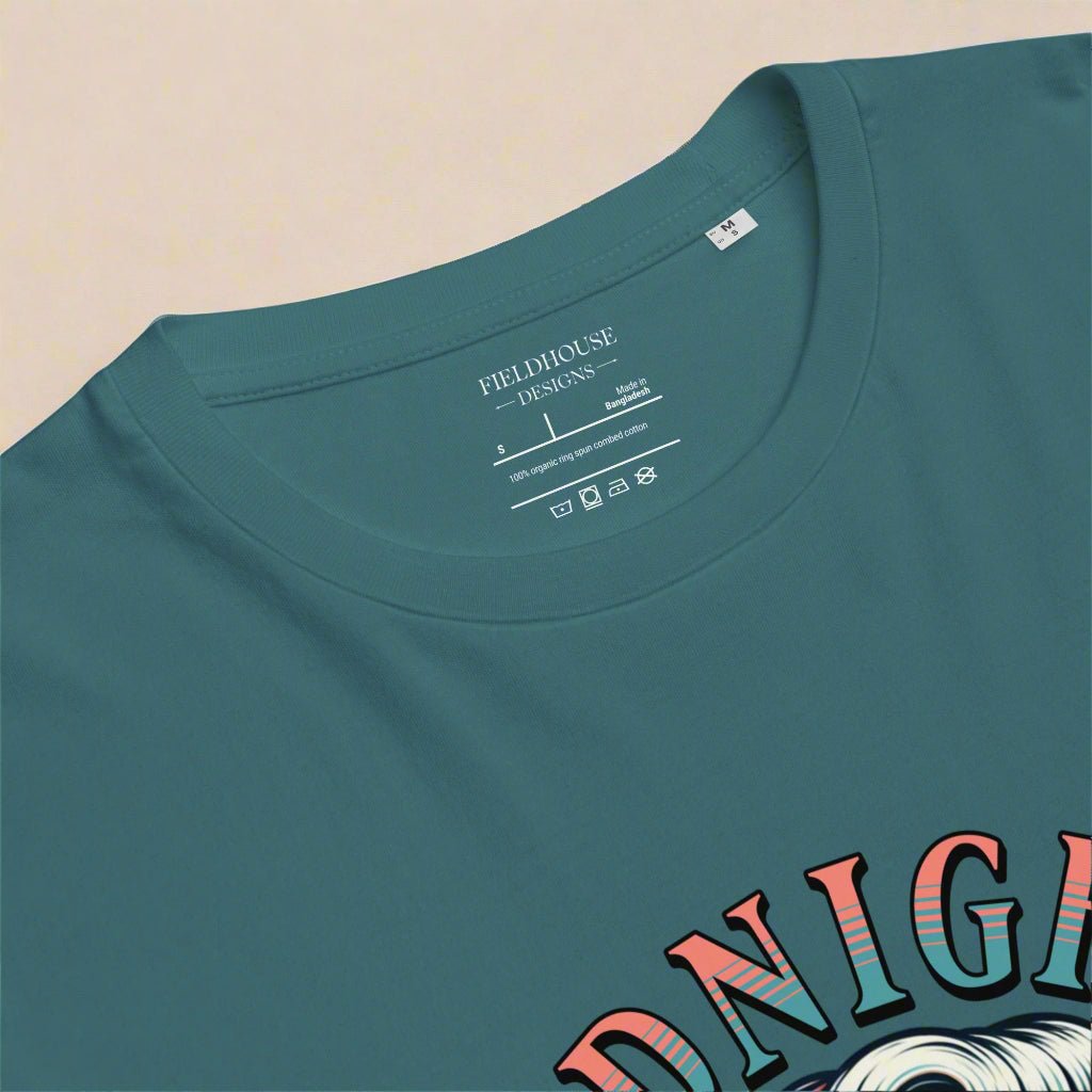 Teal t-shirt with 'Fieldhouse Designs' label on a beige background