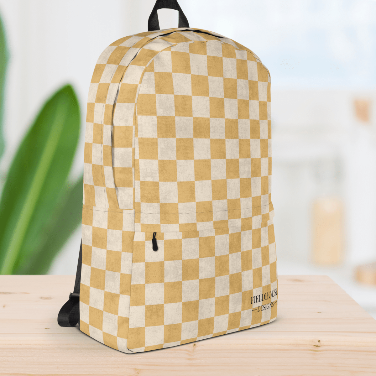 Checkered backpack on a wooden surface with a blurred background