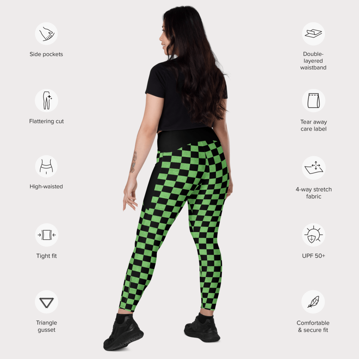Person wearing green and black checkered leggings with feature icons on a white background