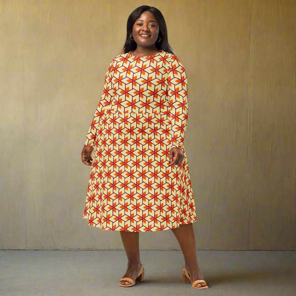 Woman wearing a patterned dress against a plain background