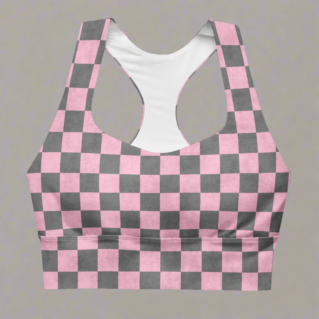 Pink and gray checkered sports bra on a gray background
