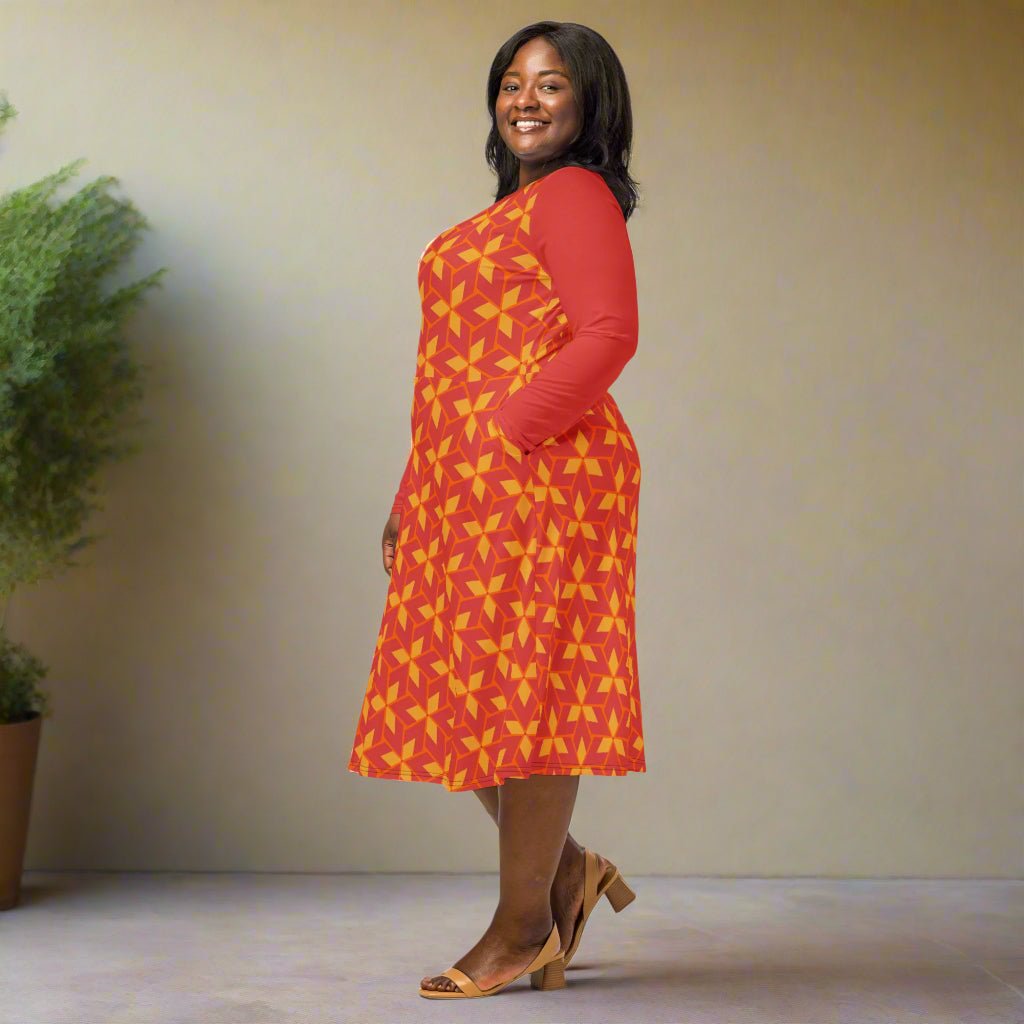 Woman wearing a red dress with yellow geometric pattern on a neutral background