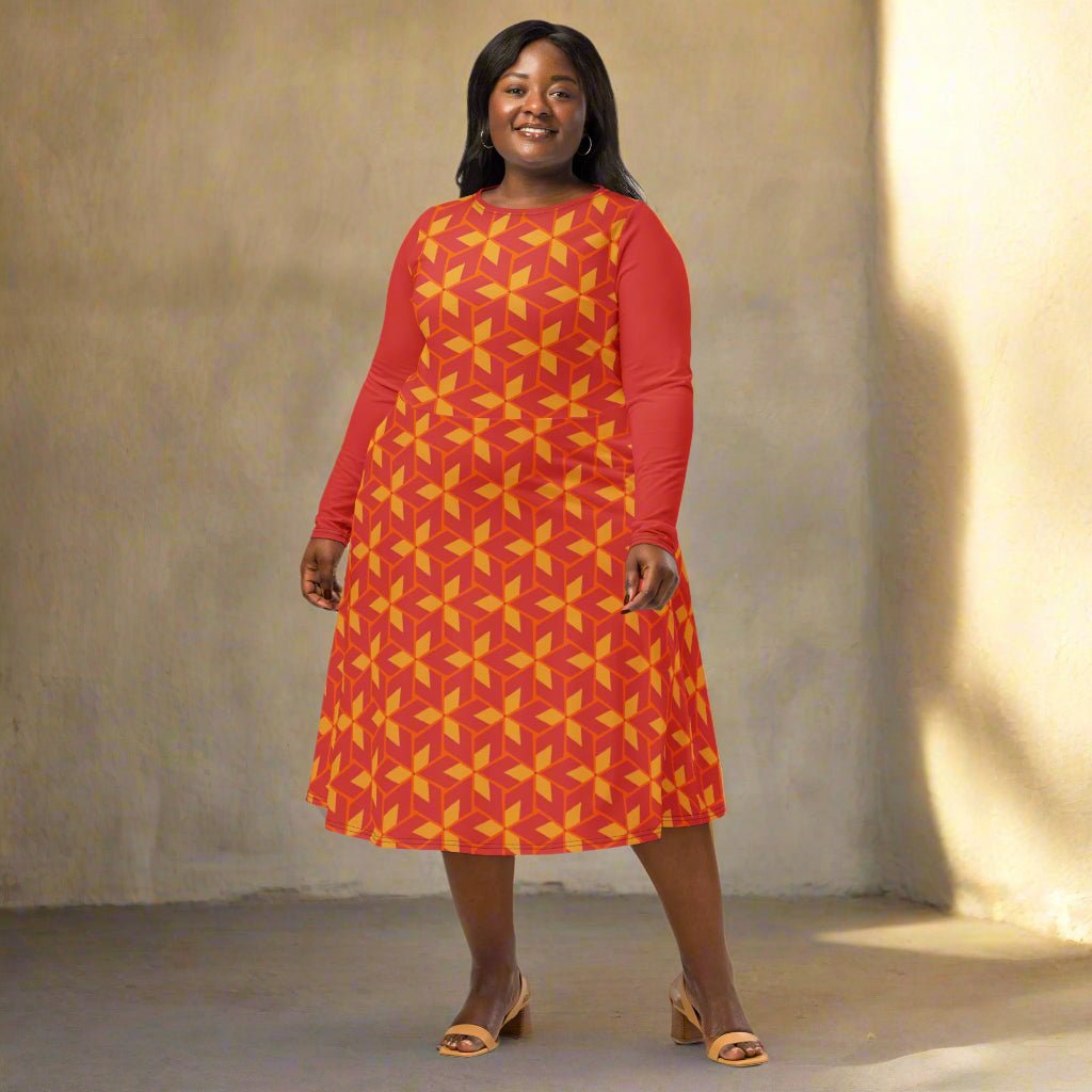 Woman wearing a red and yellow patterned dress on a neutral background