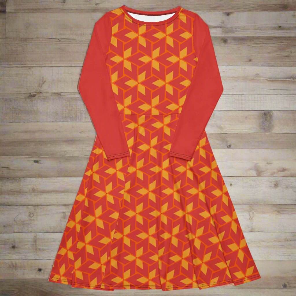Red and orange geometric patterned dress on a wooden surface