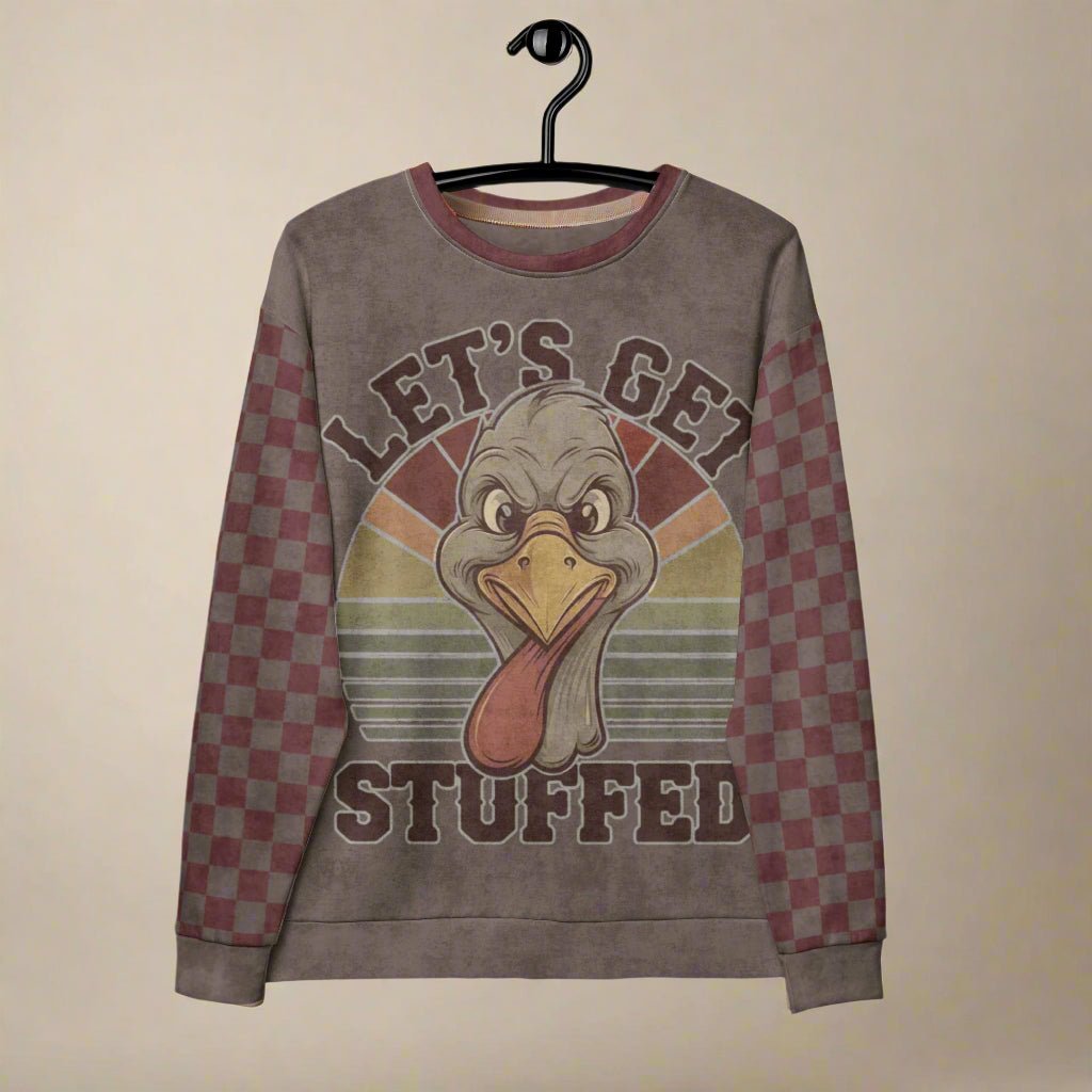 Sweatshirt with a turkey graphic and 'Let's Get Stuffed' text on a hanger