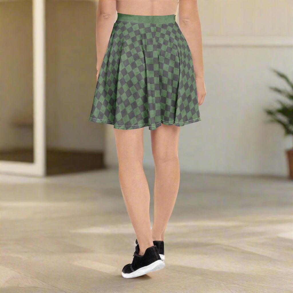 Green checkered skirt worn by a person on a porch
