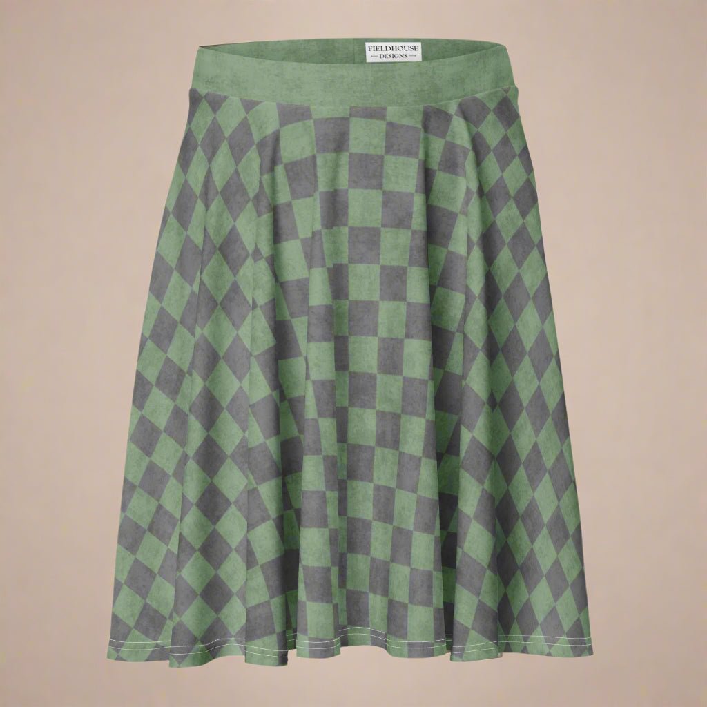 Green and gray checkered skirt on a beige background