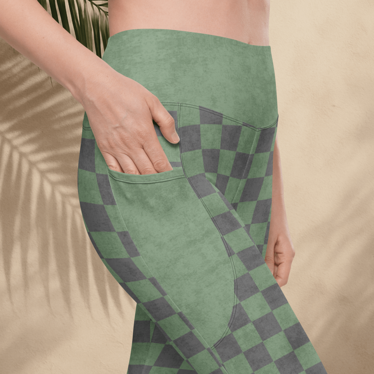 Green and gray checkered pants with a beige background