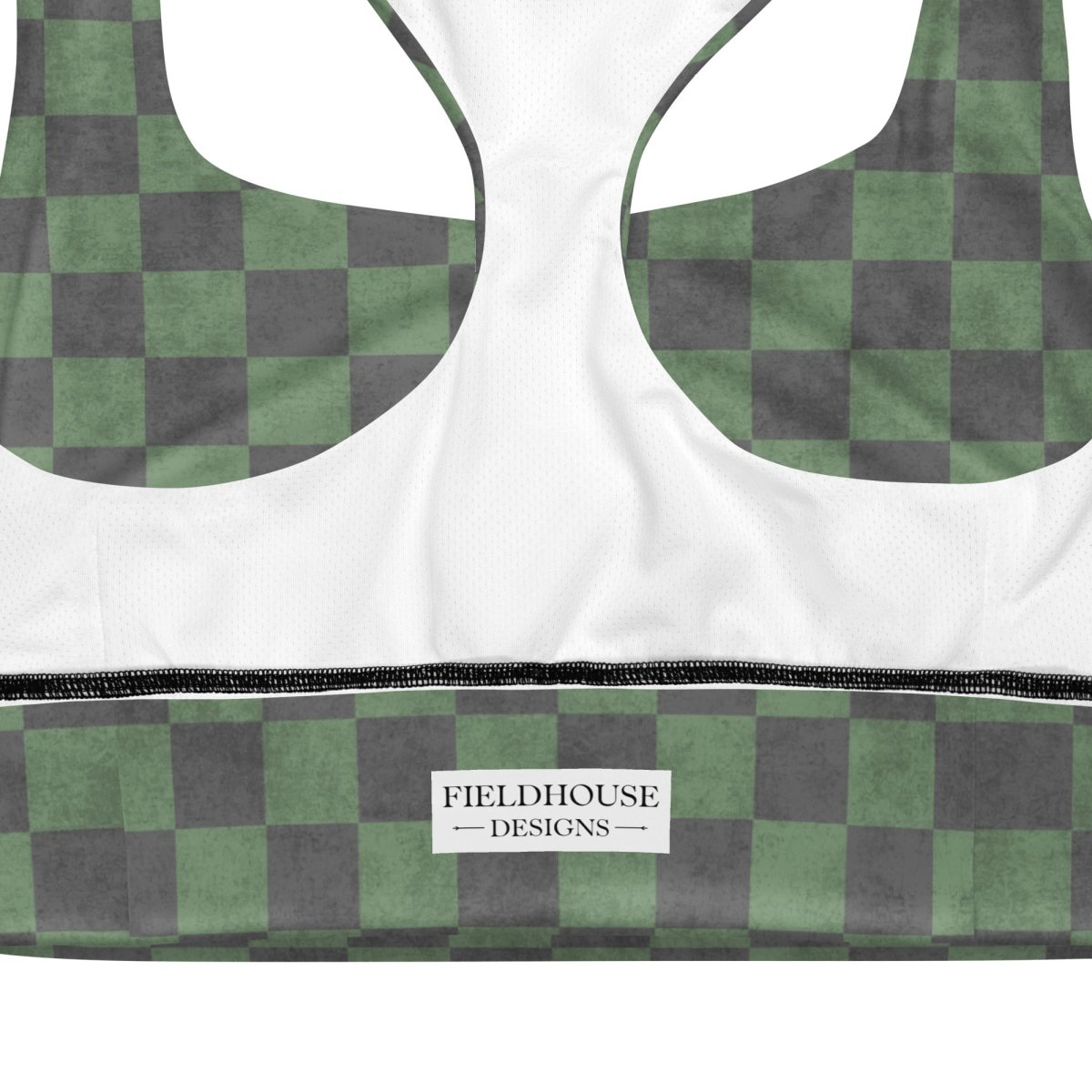Green and gray checkered sports bra with white label on a white background