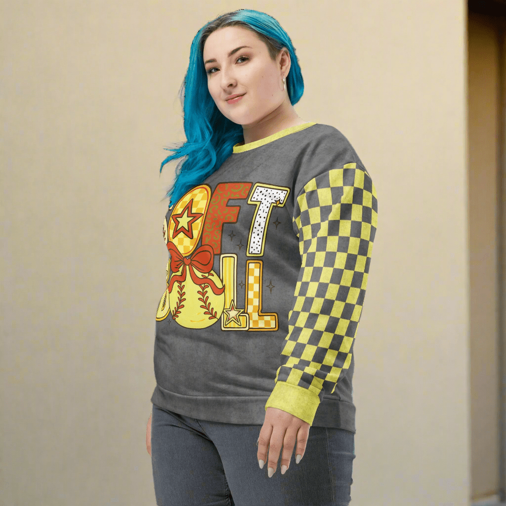 Person wearing a gray sweatshirt with 'SOFTBALL' design on a neutral background