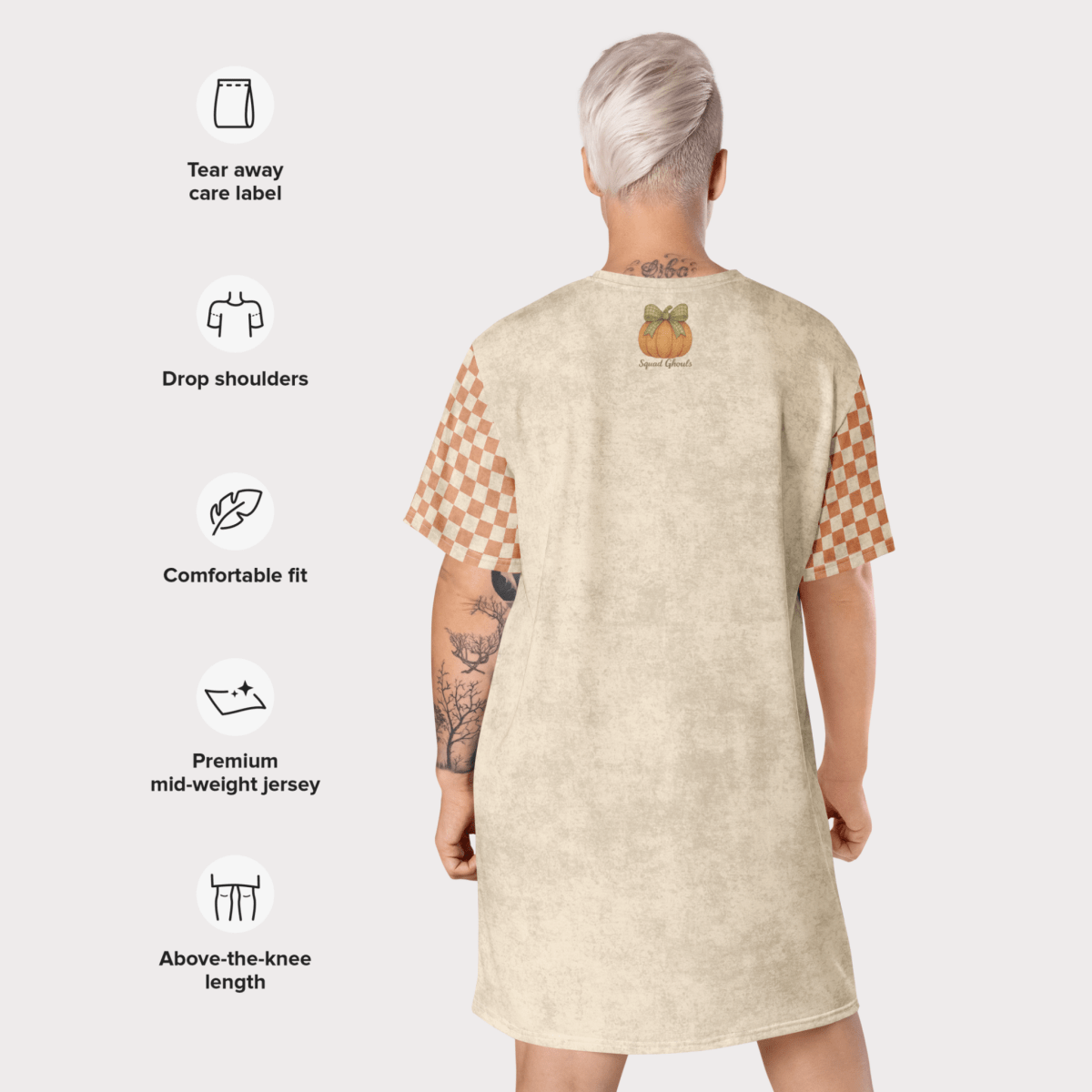 Beige dress with checkered sleeves worn by a model, featuring text labels on a white background.