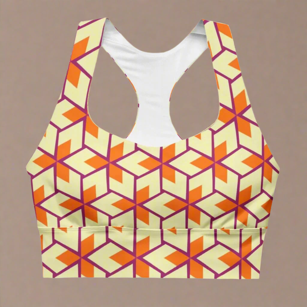 Geometric patterned sports bra on a beige background