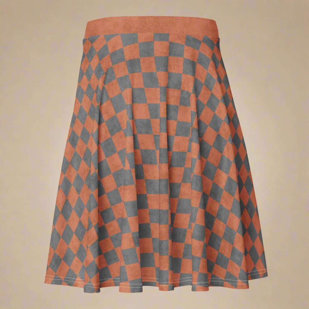 Checkered skirt with orange and gray pattern on a beige background