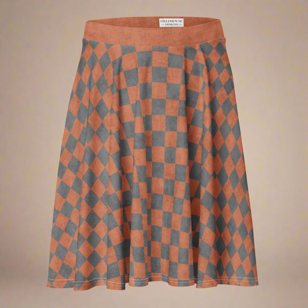Checkered skirt with orange and gray pattern on a beige background