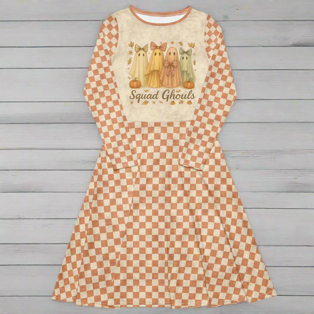 Checkered dress with ghost design and 'Squad Ghouls' text on a wood background