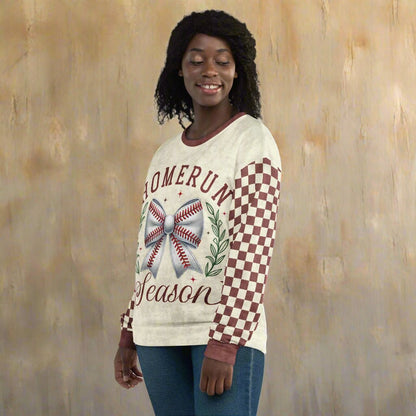 Person wearing a sweater with 'Homerun Season' text and design against a wooden background