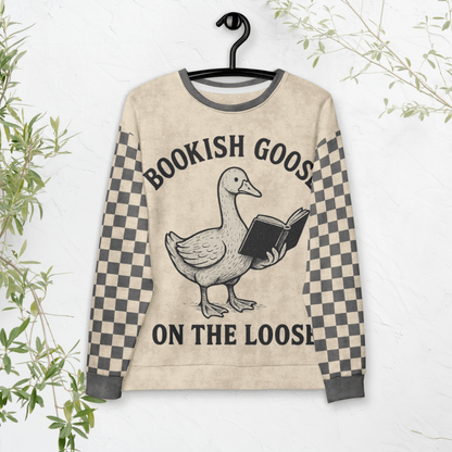 Sweatshirt with a goose holding a book design and text 'Bookish Goose on the Loose' on a hanger.