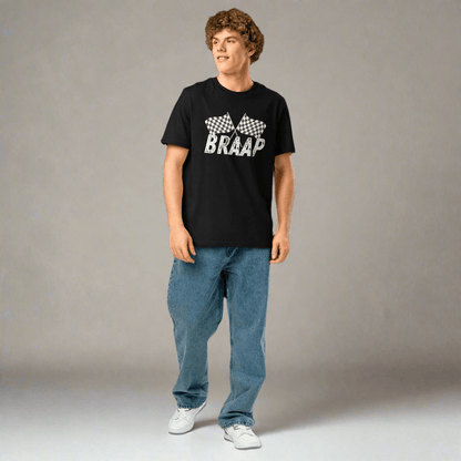 Person wearing a black t-shirt with 'BRAAP' text and checkered design on a neutral background
