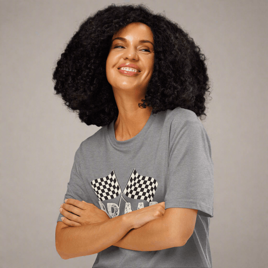 Woman wearing a gray t-shirt with checkered flag design on a neutral background